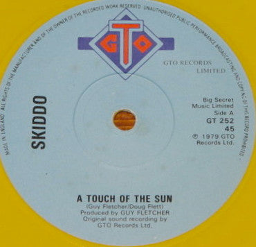 Skiddo : A Touch Of The Sun (7", Single, Yel)