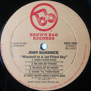 John Hambrick : Windmill In A Jet Filled Sky (LP, Album, Gat)