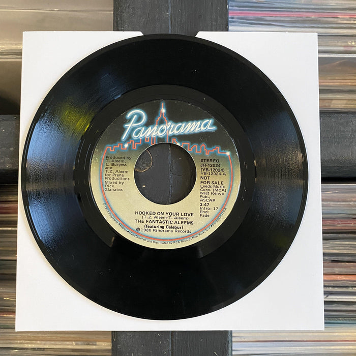 The Fantastic Aleems - Hooked On Your Love - 7" Vinyl. This is a product listing from Released Records Leeds, specialists in new, rare & preloved vinyl records.