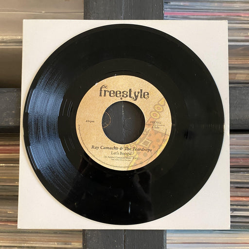 Ray Camacho & The Teardrops - Let's Boogie - 7" Vinyl. This is a product listing from Released Records Leeds, specialists in new, rare & preloved vinyl records.