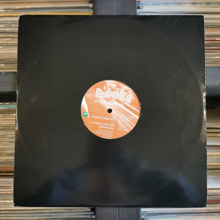 Uptown Connection - Madness - 12" Vinyl. This is a product listing from Released Records Leeds, specialists in new, rare & preloved vinyl records.