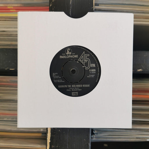 Paul McCartney - Wonderful Christmastime - 7" Vinyl. This is a product listing from Released Records Leeds, specialists in new, rare & preloved vinyl records.