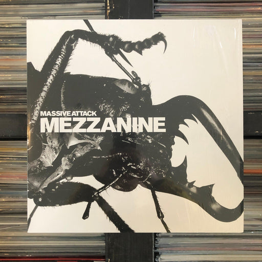 Massive Attack - Mezzanine - 2 x Vinyl LP 04.02.23. This is a product listing from Released Records Leeds, specialists in new, rare & preloved vinyl records.