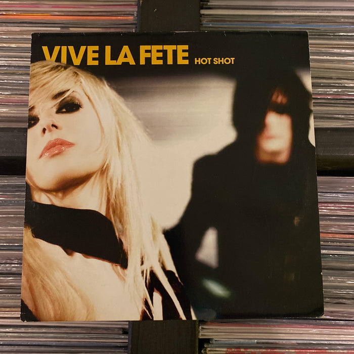 Vive La Fête! - Hot Shot - 12" Vinyl. This is a product listing from Released Records Leeds, specialists in new, rare & preloved vinyl records.