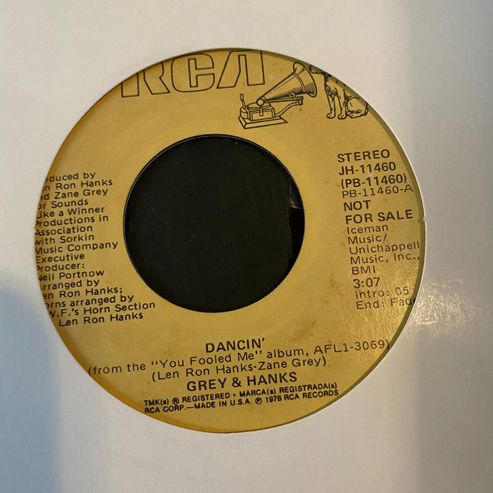 Grey And Hanks - Dancin' - 7" Vinyl. This is a product listing from Released Records Leeds, specialists in new, rare & preloved vinyl records.