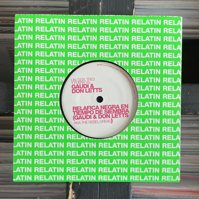 Un Dos Tres Y Fuera Vs Gaudi & Don Letts / Cumbia Moderna De Soledad - Relafica Negra En Tiempo De Siembra / Busca Perro - 7" Vinyl 30.08.23. This is a product listing from Released Records Leeds, specialists in new, rare & preloved vinyl records.