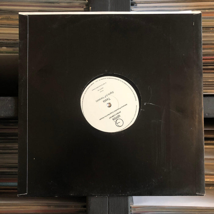 Tesla - Signs - 12" Vinyl. This is a product listing from Released Records Leeds, specialists in new, rare & preloved vinyl records.