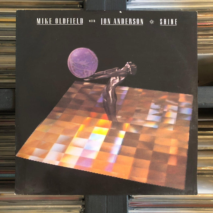 Mike Oldfield With Jon Anderson - Shine - 12" Vinyl. This is a product listing from Released Records Leeds, specialists in new, rare & preloved vinyl records.