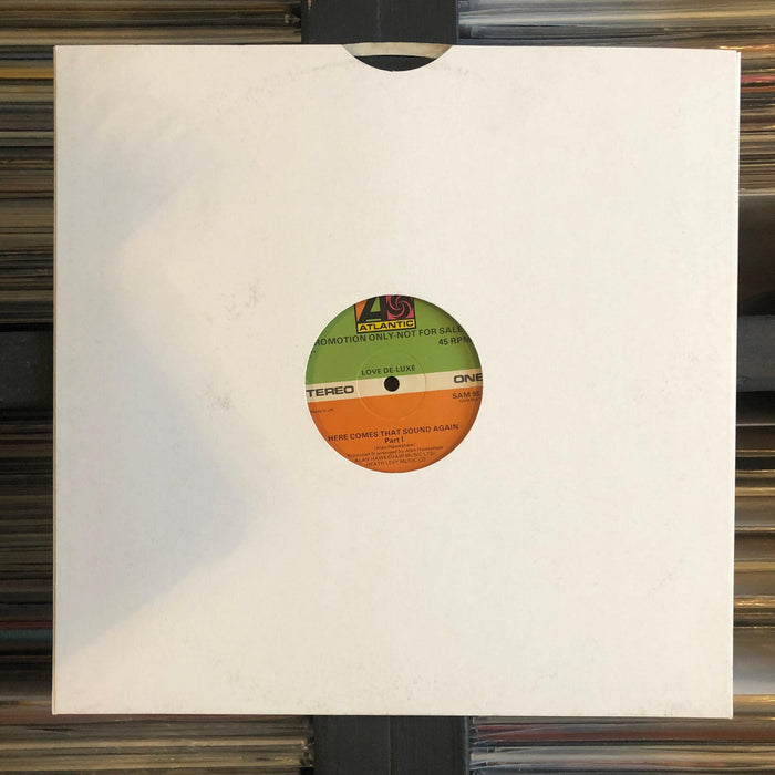 Love De-Luxe - Here Comes That Sound Again - 12" Vinyl. This is a product listing from Released Records Leeds, specialists in new, rare & preloved vinyl records.