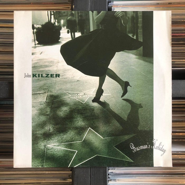 John Kilzer - Busman's Holiday - Vinyl LP. This is a product listing from Released Records Leeds, specialists in new, rare & preloved vinyl records.