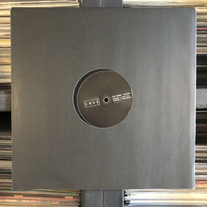 Kid Drama / Skeptical / Consequence - Kid Drama “Versus” - 12" Vinyl. This is a product listing from Released Records Leeds, specialists in new, rare & preloved vinyl records.