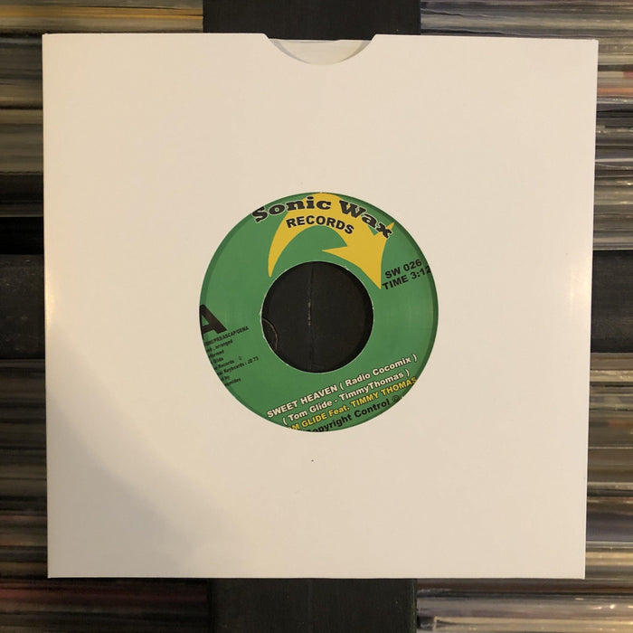 Tom Glide Feat. Timmy Thomas - Sweet Heaven - 7" Vinyl. This is a product listing from Released Records Leeds, specialists in new, rare & preloved vinyl records.