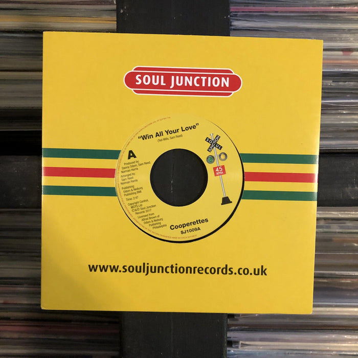 The Cooperettes / Toppiks - Win All Your Love - 7" Vinyl. This is a product listing from Released Records Leeds, specialists in new, rare & preloved vinyl records.