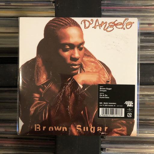 D'Angelo / Erykah Badu - Brown Sugar / On & On - 7" Vinyl. This is a product listing from Released Records Leeds, specialists in new, rare & preloved vinyl records.