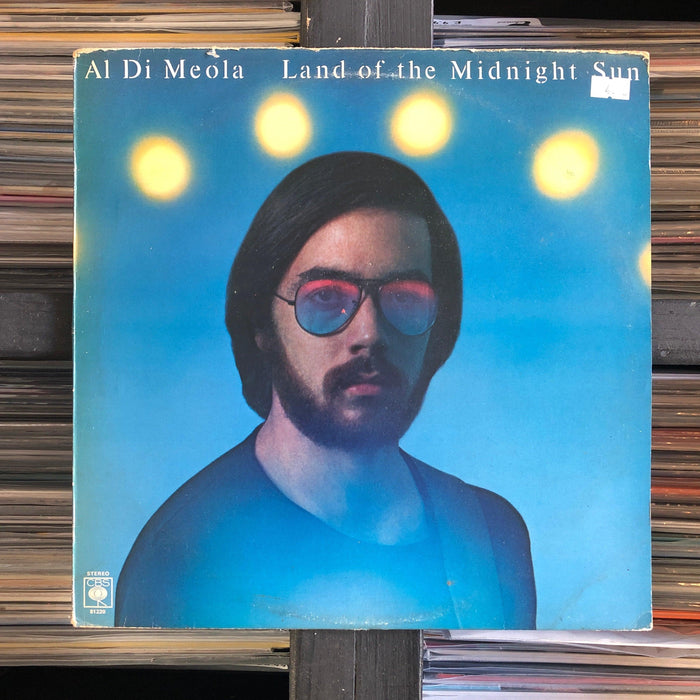 Al Di Meola - Land Of The Midnight Sun - Vinyl LP. This is a product listing from Released Records Leeds, specialists in new, rare & preloved vinyl records.