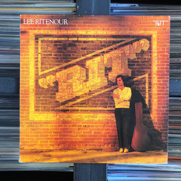 Lee Ritenour - Rit - Vinyl LP. This is a product listing from Released Records Leeds, specialists in new, rare & preloved vinyl records.