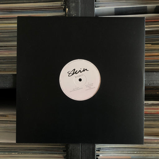 Aleksandir – Skin (Remixes) - 12" Vinyl. This is a product listing from Released Records Leeds, specialists in new, rare & preloved vinyl records.