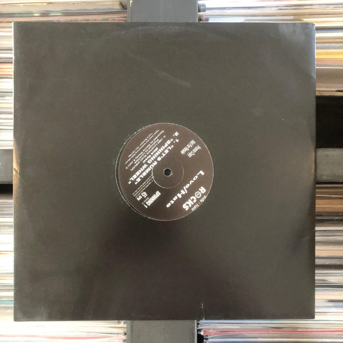 Love/Hate - Spinning Wheel / Let's Rumble - 12" Vinyl. This is a product listing from Released Records Leeds, specialists in new, rare & preloved vinyl records.