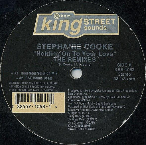 Stephanie Cooke - Holding On To Your Love (The Remixes) - 12" Vinyl. This is a product listing from Released Records Leeds, specialists in new, rare & preloved vinyl records.